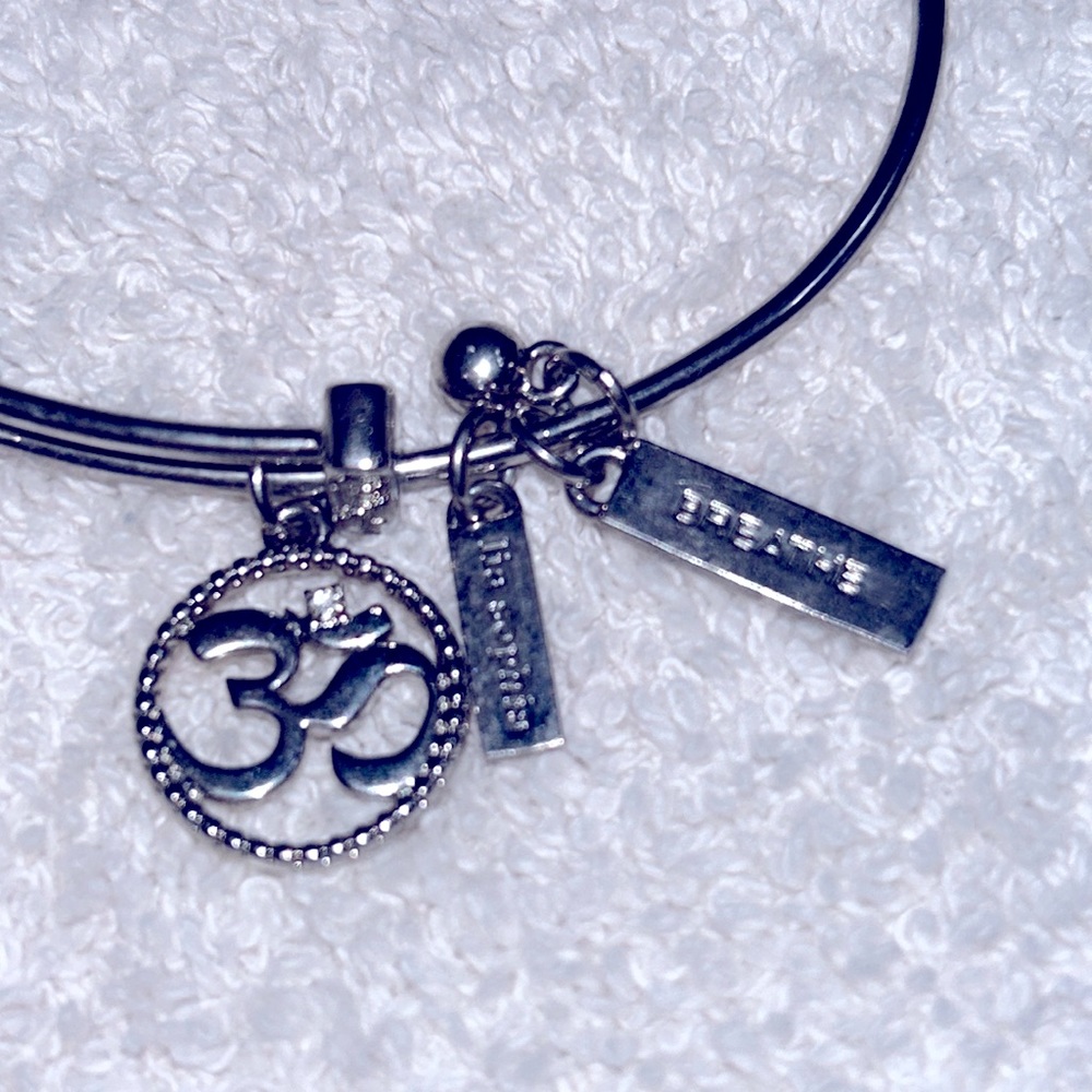 Lia Sophia adjustable silver bangle with charm